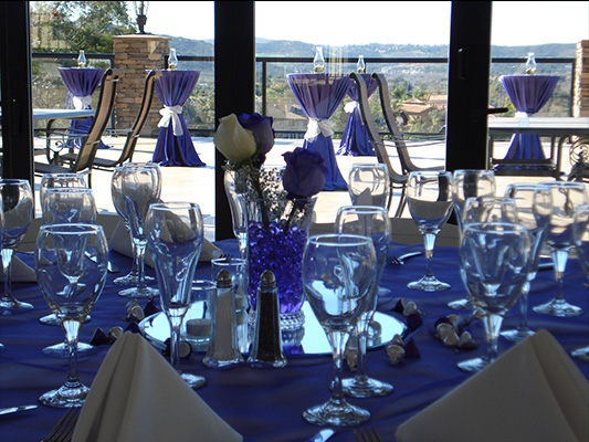 shaded banquet seating with blue table tops